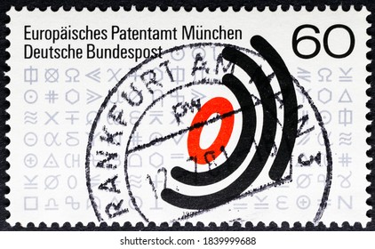 MADRID, SPAIN - OCTOBER 2, 2020. Vintage stamp printed in Germany shows "European Patent Office Munich", European Patent Protection and technical symbols