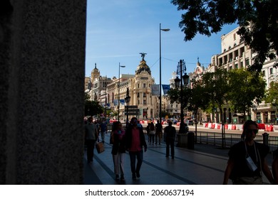 Madrid, Spain. October, 2021. Calle Alcalá (Alcalá Street) With People Walking And Historical And Beautiful Metrópolis Building Close To Gran Vía Street.