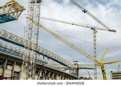 MADRID, SPAIN - SEPTEMBER 13, 2021: Cranes In The Renovation Works Of The Santiago Bernabéu Stadium, Home Of Real Madrid