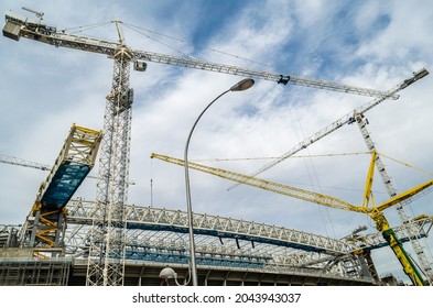 MADRID, SPAIN - SEPTEMBER 13, 2021: Cranes In The Renovation Works Of The Santiago Bernabéu Stadium, Home Of Real Madrid