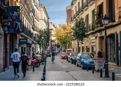 Madrid, Spain - September 17, 2022: Busy Street In The Trendy Neighborhood Of Malasana. Corredera Baja Of San Pablo Street With Charming Stores And Cozy Bars