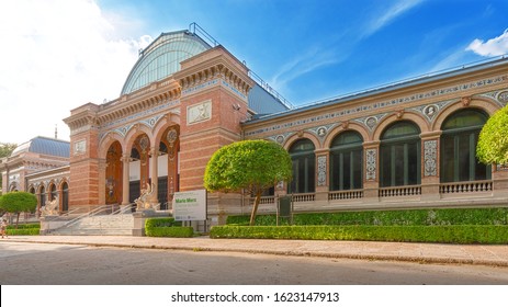 Madrid, Spain - September 19, 2019: Buen Retiro Park Is A City Park In Madrid's Retiro District.  Palace Of Velazquez (Palacio De Velázquez) - The Work Of The Architect Ricardo Velazquez Bosco. 