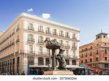 Madrid, Spain - September 19, 2019: Puerta Del Sol. A Famous Bronze Sculpture In A Busy Town Square Depicting A Bear By A Strawberry Tree.