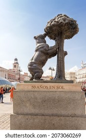 Madrid, Spain - September 19, 2019: Puerta Del Sol. A Famous Bronze Sculpture In A Busy Town Square Depicting A Bear By A Strawberry Tree.