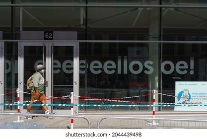 Madrid, Spain - September 20 2021:  Latino Man Wearing Mask About To Enter The Wizink Center Vaccination Point To Take Covid Vaccine