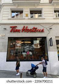 Madrid, Spain - September 24, 2022: Canadian Fast Food Restaurant Tim Hortons At Madrid City Centre Near Plaza Santo Domingo Square. Name And Logo Above The Window. Street View