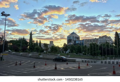 Madrid/Spain; 06/28/2017. Sunrise In The Center Of Madrid, Nuevos Ministerios Park (English: New Ministries Park) With The Branch Building Of The Spanish Insurance Company 