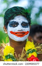 MADURAI, INDIA - 02TH OCTOBER 2022: In Traditional Village Festival Man Painted Joker Getup In His Face. 