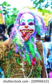 MADURAI, INDIA - 02TH OCTOBER 2022: In Traditional Village Festival Youngster Putting Mask And  Scare People.