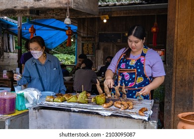 Mae Kampong Pang Klang village in Chiang Mai Thailand December 2021, people preparing street food at Mae Kampong village