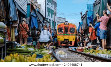 Maeklong Railway Market Thailand, Fresh Market on the Railroad Track, Mae Klong Train Station, Bangkok a famous railway market in Thailand
