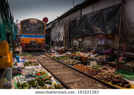 MAEKLONG, THAILAND: The famous railway markets at Maeklong, Thailand,