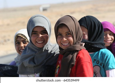 Mafraq, Jordan - June 2, 2014 : Syrian children posing for Camera at the Zaatari refugee Camp in Mafraq, Jordan