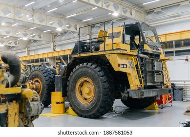 Magadan, December 12, 2020. This Picture Shows A Mining Equipment Repair Plant. In The Foreground Is A Disassembled Komatsu HD465 Dump Truck. 