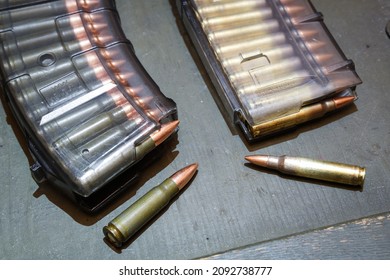 Magazine With Cartridges From The American Ar15 Assault Rifle Vs  The Magazine From The Russian Assault Rifle Ak.