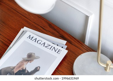 Magazine on a wooden table - Shutterstock ID 1996631969