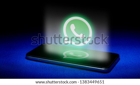 Magelang, Central Java, Indonesia, April 29, 2019.Hologram of whatsapp logo. hologram whatsapp logo image on blue background . The concept of next technology,social media, - Image