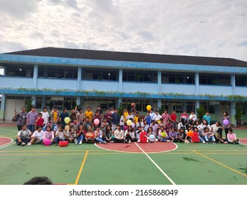 Magelang, Central Java, Indonesia - May 27, 2022:
Student Taking Photo For School Yearbook