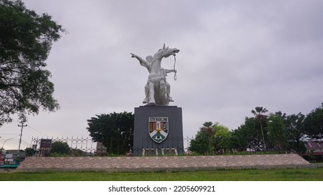 Magelang, Indonesia - September 17th 2022 : Diponegoro Statue Ride The Horse Build On The Park With Cloudy Sky. Building Icon On The Magelang Town Square
