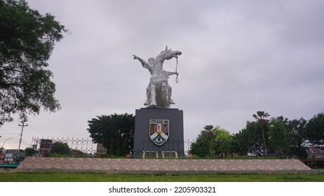 Magelang, Indonesia - September 17th 2022 : Diponegoro Statue Ride The Horse Build On The Park With Cloudy Sky. Building Icon On The Magelang Town Square
