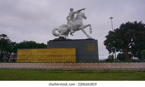 Magelang, Indonesia - September 17th 2022 : Diponegoro Statue Ride The Horse Build On The Park With Cloudy Sky. Building Icon On The Magelang Town Square