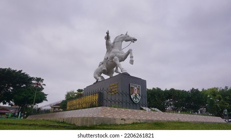 Magelang, Indonesia - September 17th 2022 : Diponegoro Statue Ride The Horse Build On The Park With Cloudy Sky. Building Icon On The Magelang Town Square
