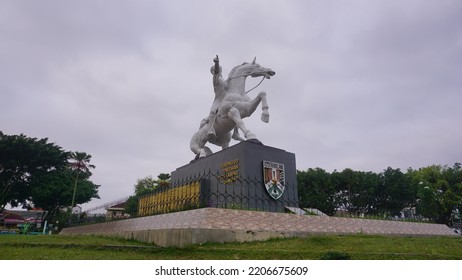 Magelang, Indonesia - September 17th 2022 : Diponegoro Statue Ride The Horse Build On The Park With Cloudy Sky. Building Icon On The Magelang Town Square
