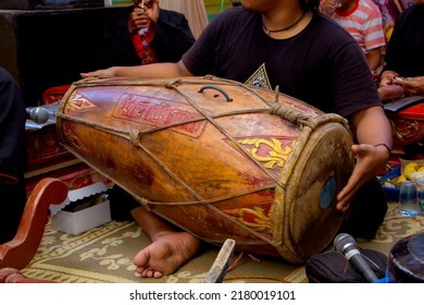 Magetan, East Java, Indonesia - January 01, 2022: Indonesian Javanese musical instrument. Javanese men playing gamelan, drums, bonang or other famous Javanese traditional musical instruments.