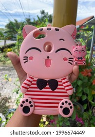 Magetan, Indonesia - June 25th, 2021 - A Cute Pink Phone Case Shaped Like A Cat