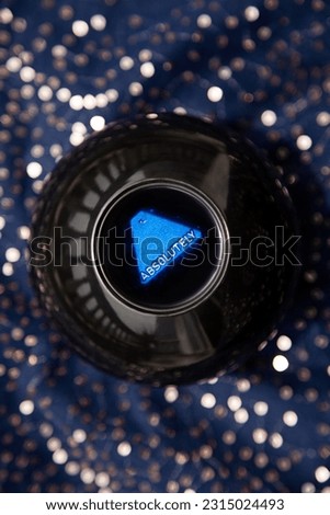 Magic ball game for predicting the future gives an answer Absolutely to a question. Fortune telling toy giving a positive answer