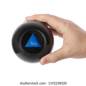 Magic ball with prediction No in hand isolated on white background