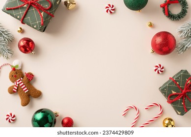 Magic of Christmas and New Year's awaits, featuring top-down view of presents, baubles, gingerbread man decor, jingling bells, small wreath, candy canes, fir twigs on light backdrop text or ad space