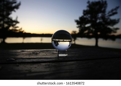 Magic crystal ball reflection at sunset on the lake at California