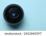 Magic eight ball with prediction The Stars Say No on light blue background, top view. Space for text