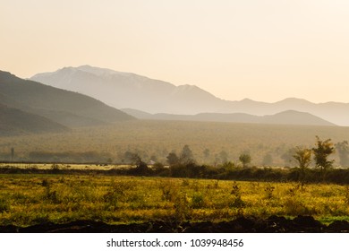 magic enchanting nature and landscape, mountains and slopes, endless green fields and meadows - Shutterstock ID 1039948456