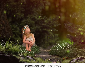 Magic Fairy Forest. A Small Child Watching Fireflies. A Fairy Tale For Children