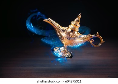 Magic Genie Lamp With Smoke On A Dark Background