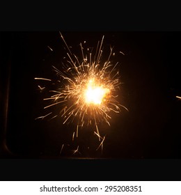 Magic glowing Flow of Sparks in the Dark. Sparks - Shutterstock ID 295208351