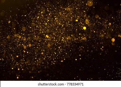 Magic Glowing Gold Dust Particles Flowing Abstract Background 