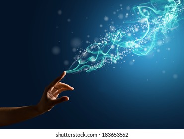 Magic Hand, Conceptual Image With Glow On A Colored Background