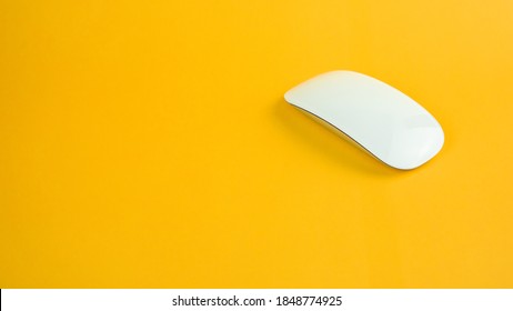 Magic Mouse On The Yellow Table