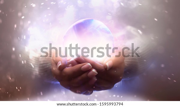 Magic Particles Emanating Female Hands Glass Stock Photo