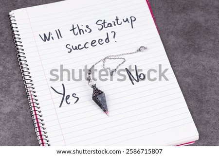 Magic Pendulum swinging between Yes and No over the question Will this Start Up succeed? Concept of irrational business decisions, mysticism, humorous critique of modern financial planning.