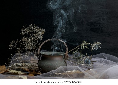 Magic Pot With Herbs And Witchcraft