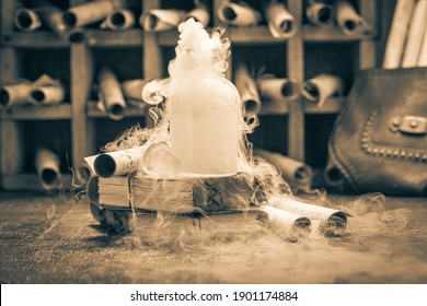 Magic Research Lab Full Of Medieval Scrolls And Chemical Flask On Wooden Table