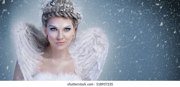 Magic snow queen - winter woman with wings, winter fairy