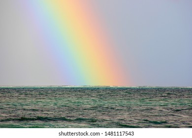 The magic view to beautiful rainbow over the ocean from the coast of Mauritius Island,Africa
