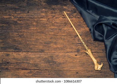 Magic Wand On Wooden Table, Magic Wand Wizard Tool On Vintage Wooden Background.