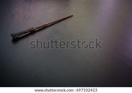 Magic wand on wooden table, Wizard tool.