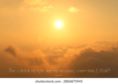 A magical sunset high over the clouds with Psalm 27:1, The Lord is my light and my salvation; whom shall I fear?